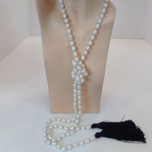 66" of Freshwater Pearls Knotted W Black Tassels on Each End